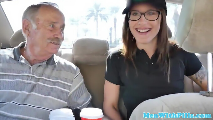 Young Spectacles-Wearing Girl Enjoys Experiencing An Older Man'S Penis